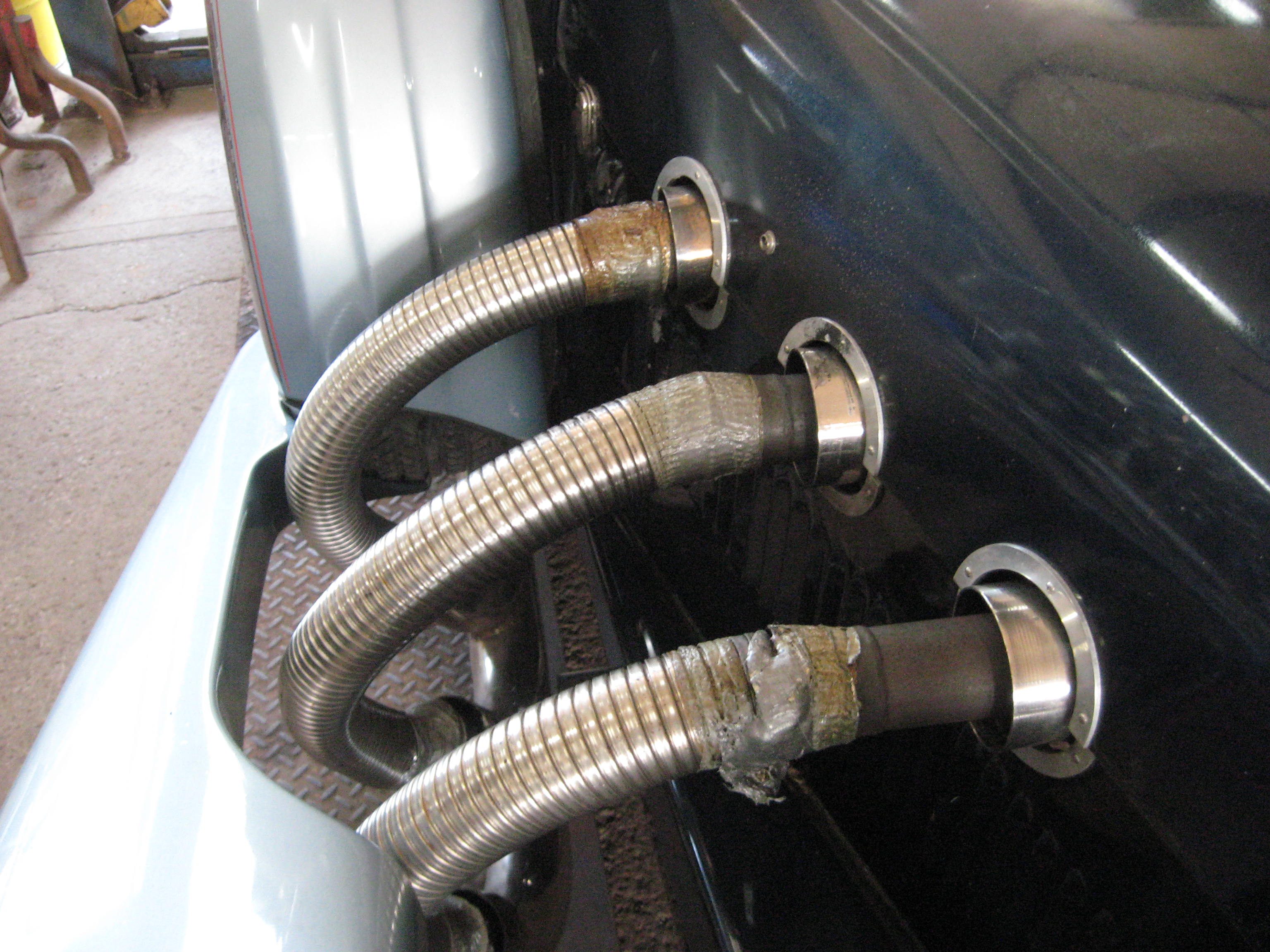 Automotive Exhaust Specialists work